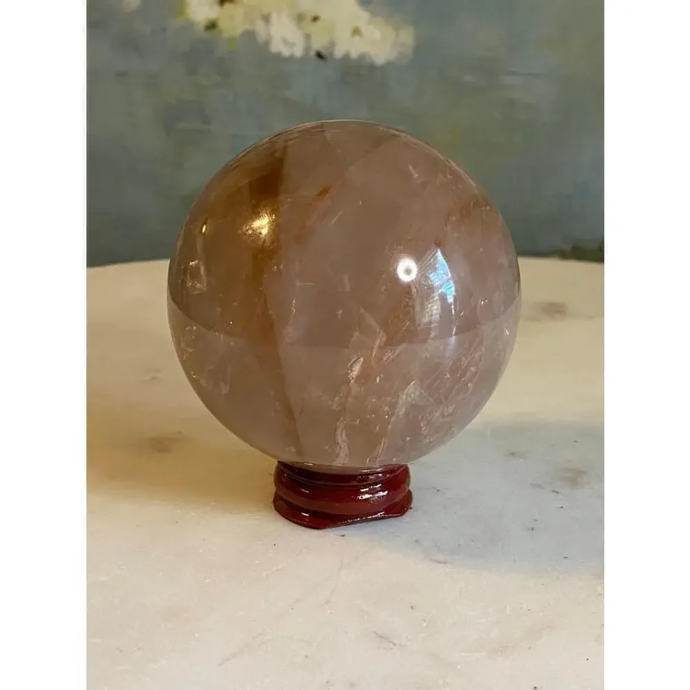 Large hematoid fire quartz sphere